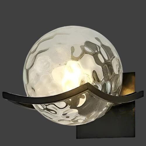 Modern LED wall lamp with sleek glass finish, ideal for contemporary home decor and energy-efficient lighting.