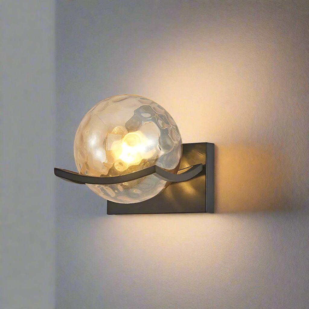 Modern LED wall lamp with sleek glass finish, ideal for contemporary home decor and energy-efficient lighting.