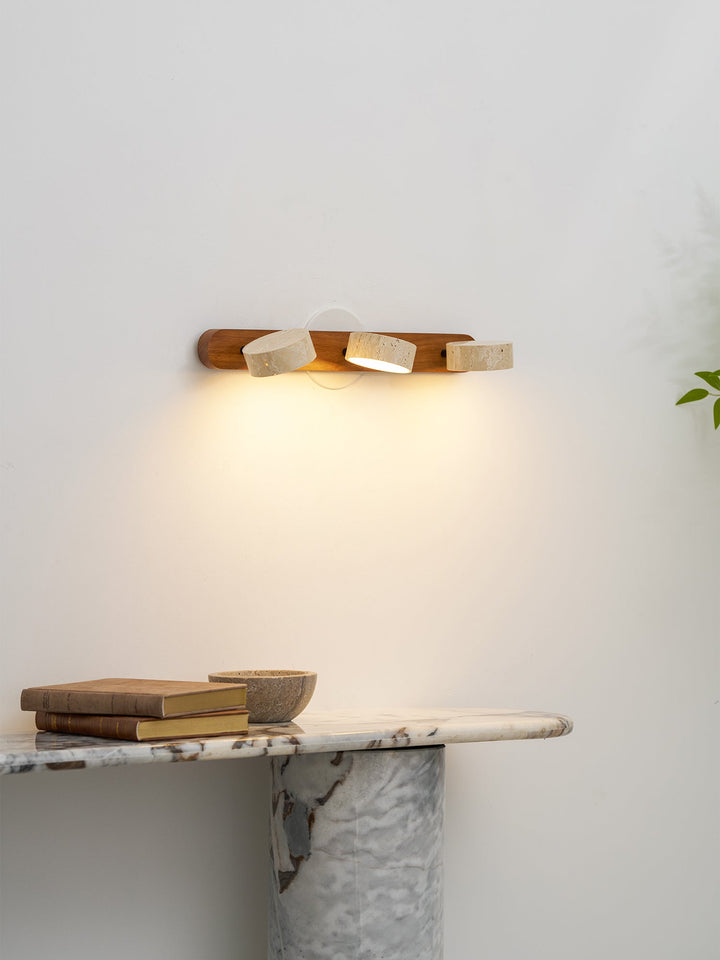 Dimmable LED wall light, versatile for bedroom and living areas.