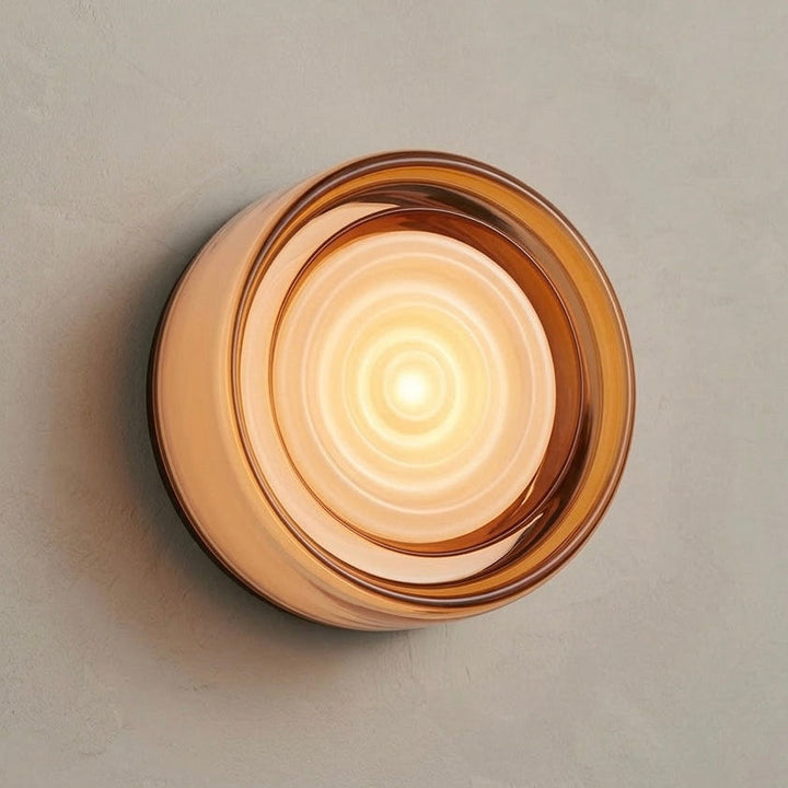 Modern LED wall sconce with customizable glass & base, ideal for contemporary indoor lighting.
