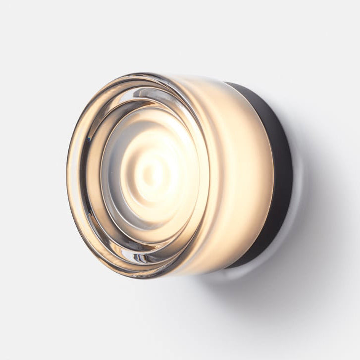 Contemporary LED wall sconce with customizable glass, a perfect modern indoor light fixture.