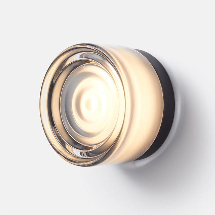 Contemporary LED wall sconce with customizable glass, a perfect modern indoor light fixture.
