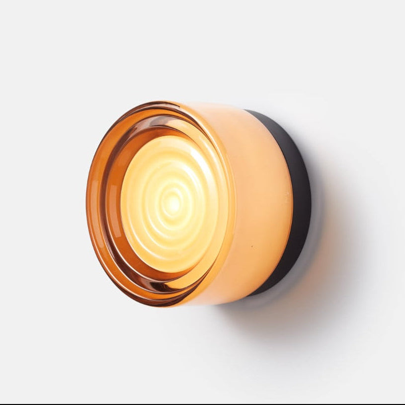 Entryway modern LED wall sconce with custom color options for a welcoming & stylish glow.