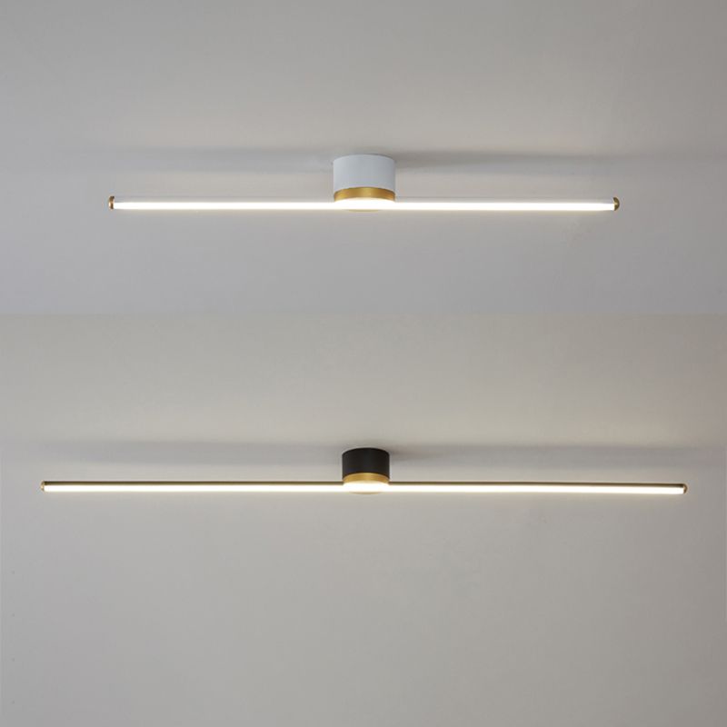 Contemporary linear LED flush mount ceiling light. Minimalist metal fixture enhances modern home lighting.