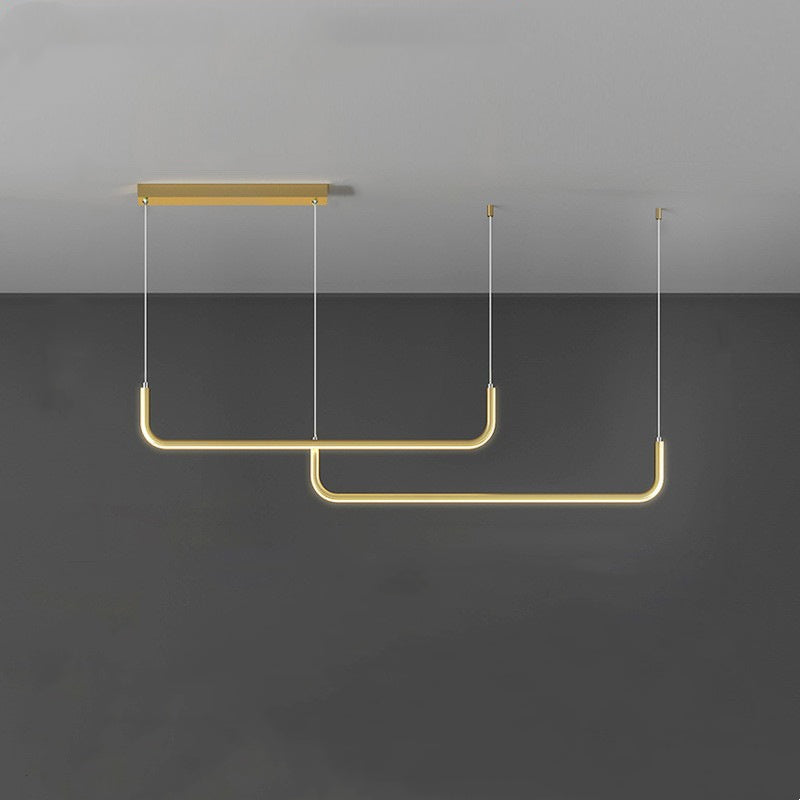 Adjustable modern linear LED pendant for dining rooms, offering versatile illumination.