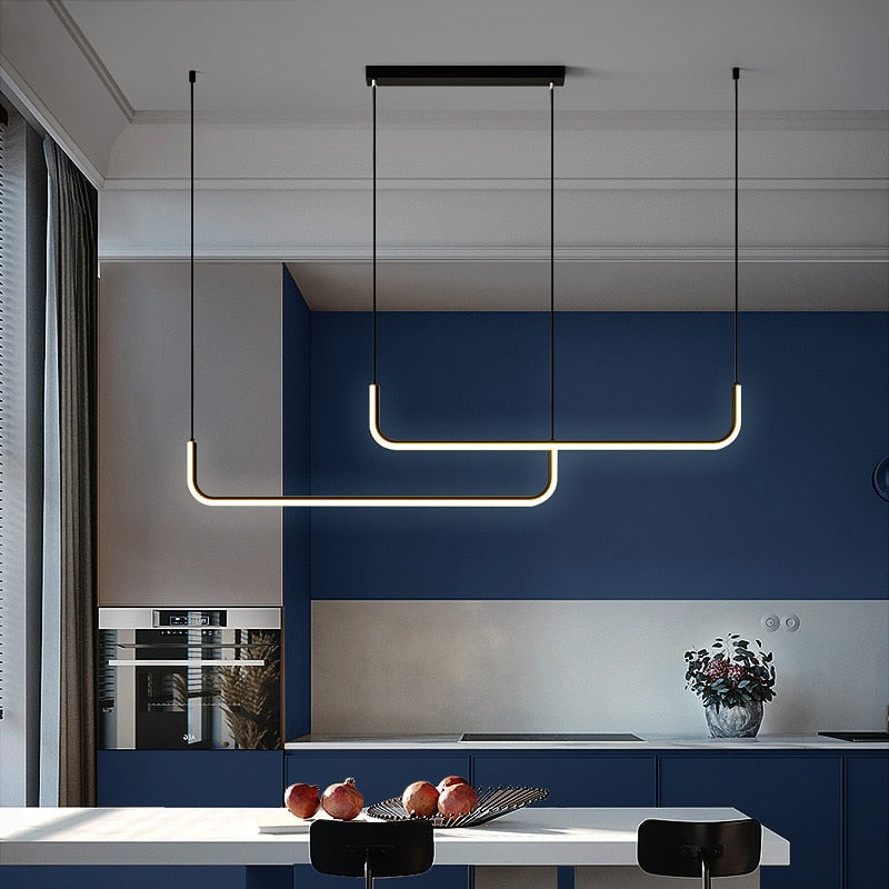 Modern linear LED pendant light, illuminating dining & living areas with crisp, clear light.