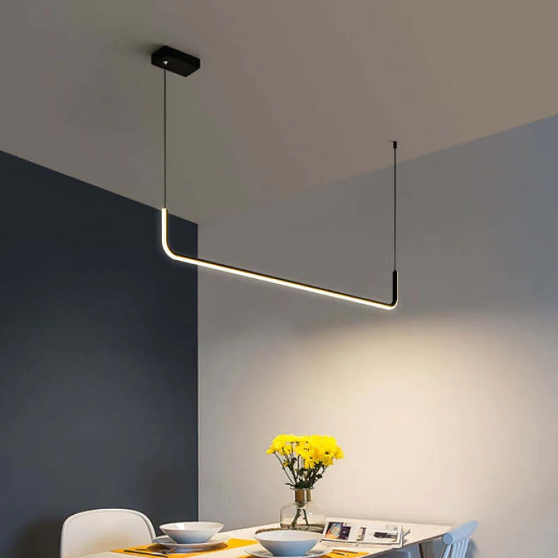 Modern linear LED pendant light for dining room, featuring a sleek, minimalist design.