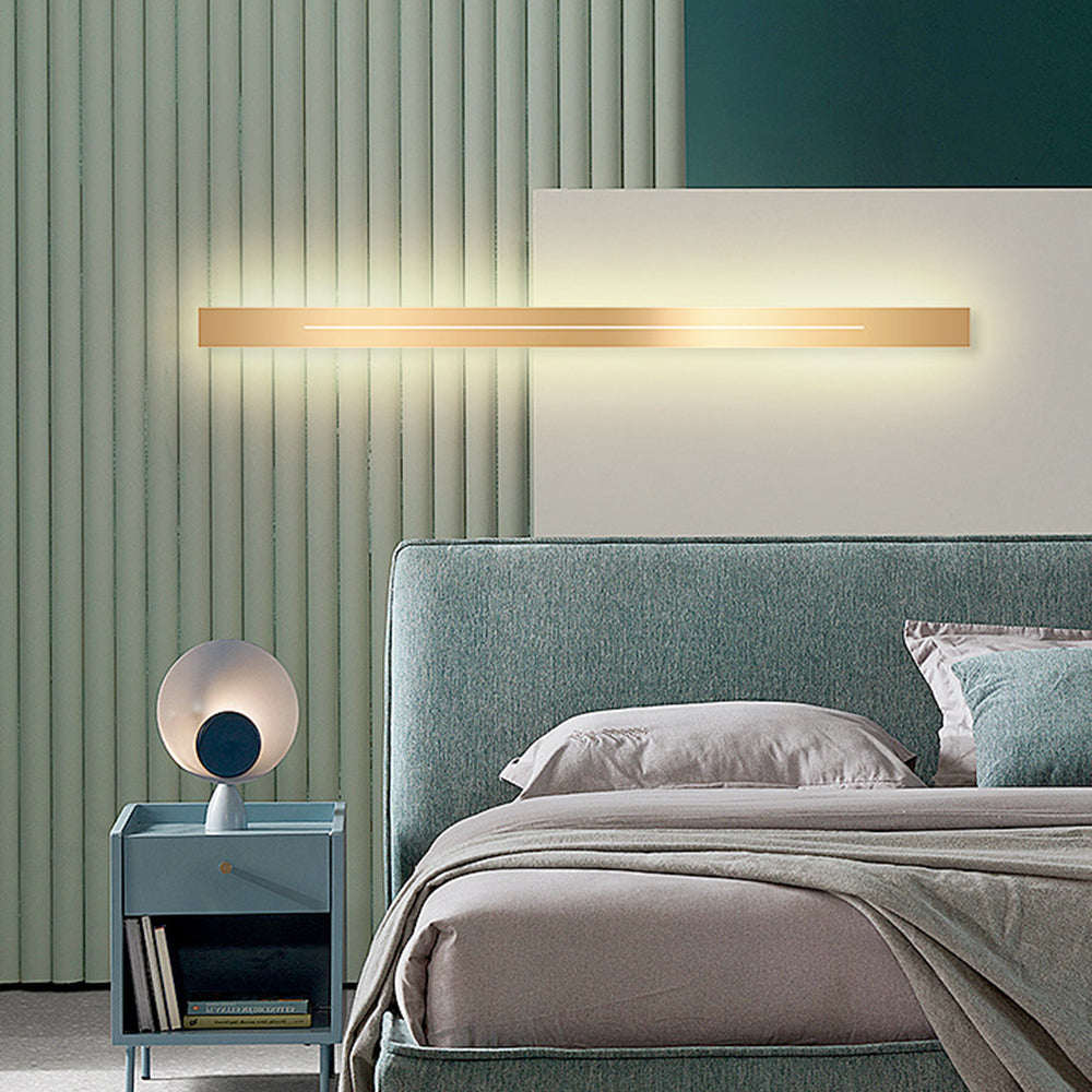 Contemporary LED wall sconce, sleek linear design, accent lighting solution.