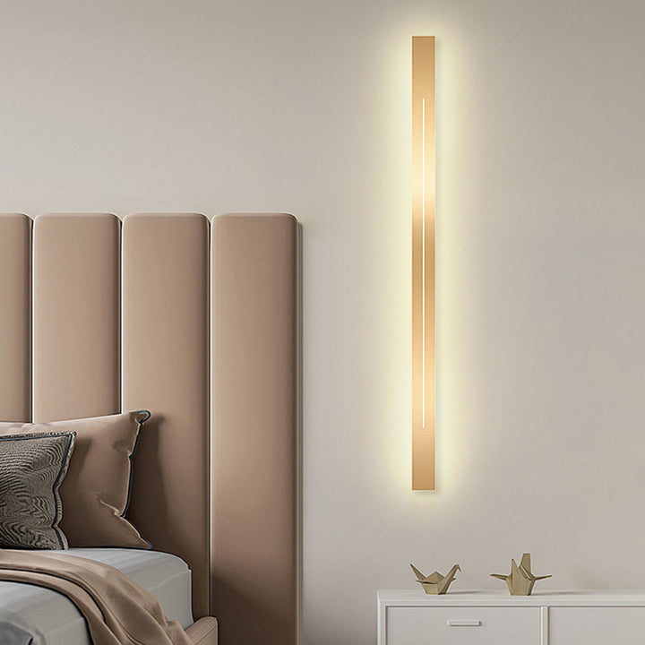 Sleek linear LED wall lamp for modern interiors, provides beautiful ambient light.