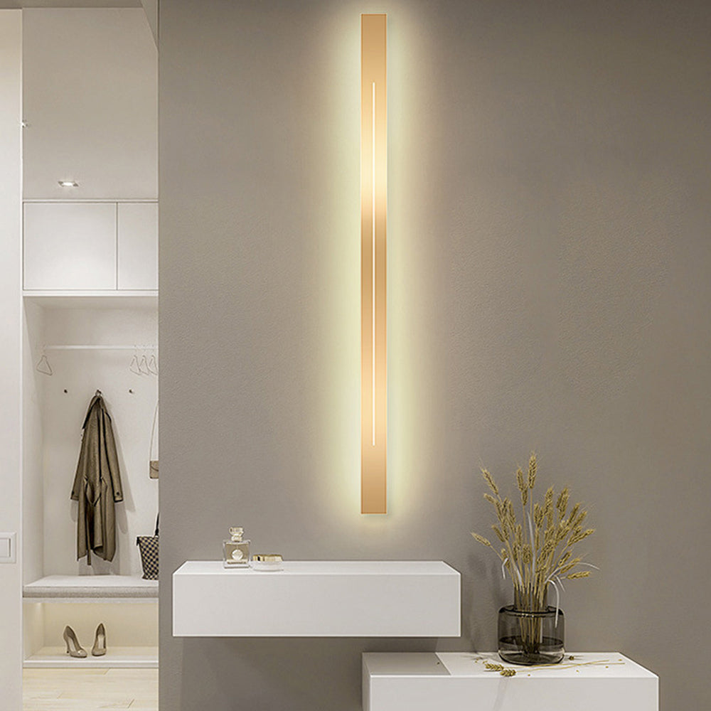 Accent linear LED wall light, contemporary decor with dimmable ambient glow.