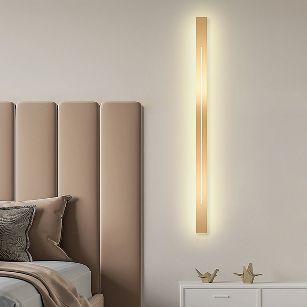 Sleek metal linear LED indoor wall lamp, modern lighting for elegant spaces.
