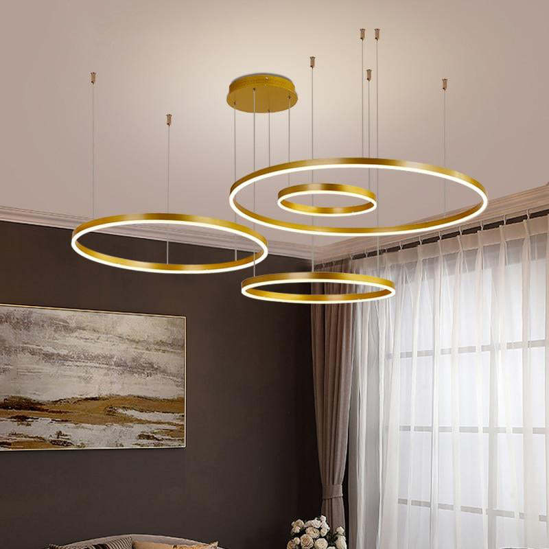 Lorenna LED ring pendant light illuminating a contemporary living space.
