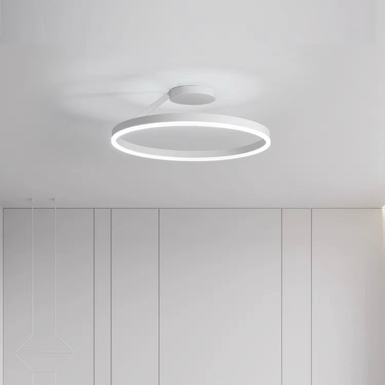 Minimalist LED ceiling light fixture, provides bright, even home illumination.