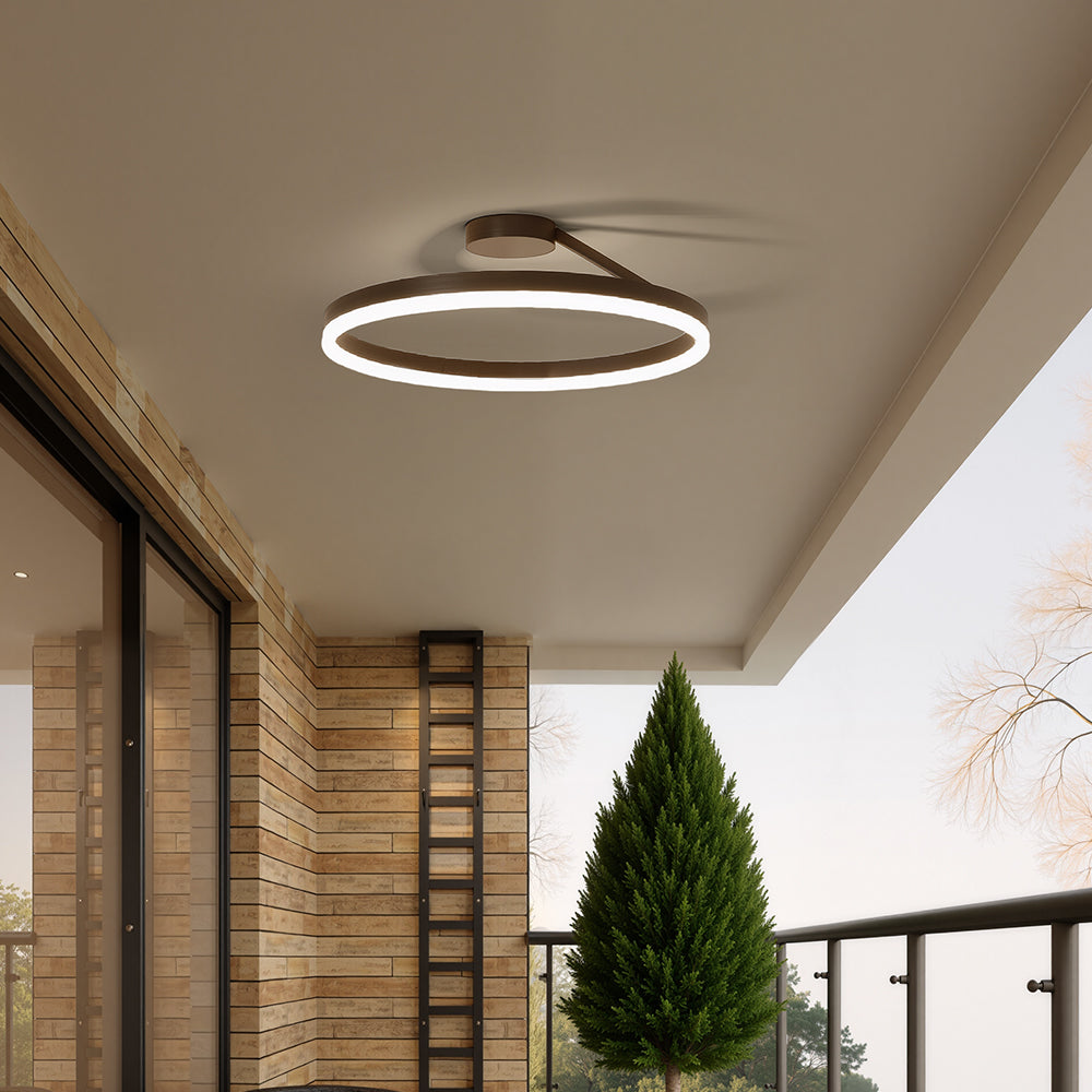 Circular modern LED ceiling light, minimalist and energy-efficient for homes.