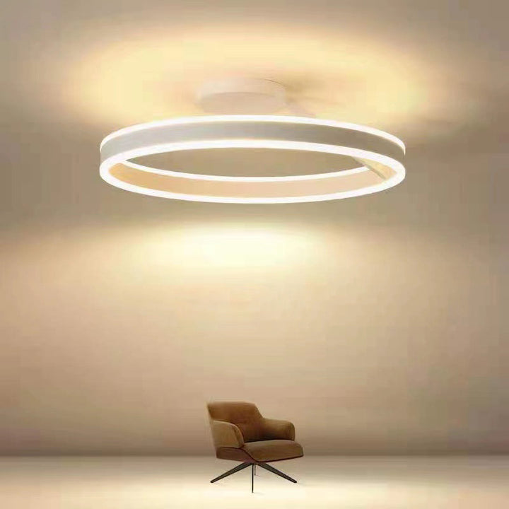 Stylish flush mount LED ceiling fixture, enhances modern home interior lighting.
