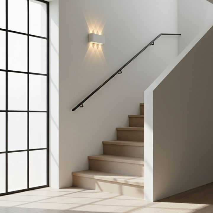 Sleek integrated LED wall light, perfect for modern minimalist indoor spaces.
