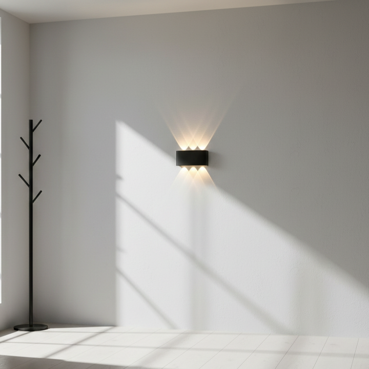 Stylish modern LED wall light for living room, providing ambient illumination.