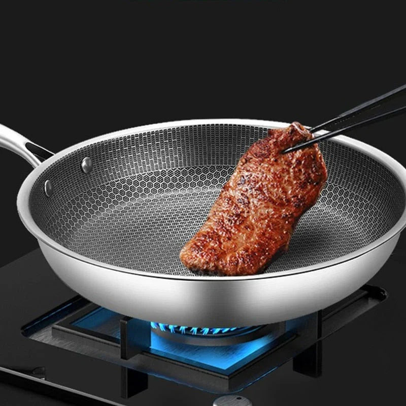 Modern non-stick frying pan for effortless cooking. Durable stainless steel cookware, perfect for any kitchen.