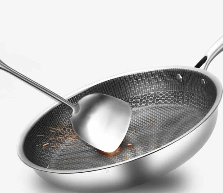 Durable induction-ready non-stick frying pan. Stainless steel cookware for easy cleaning & everyday cooking.