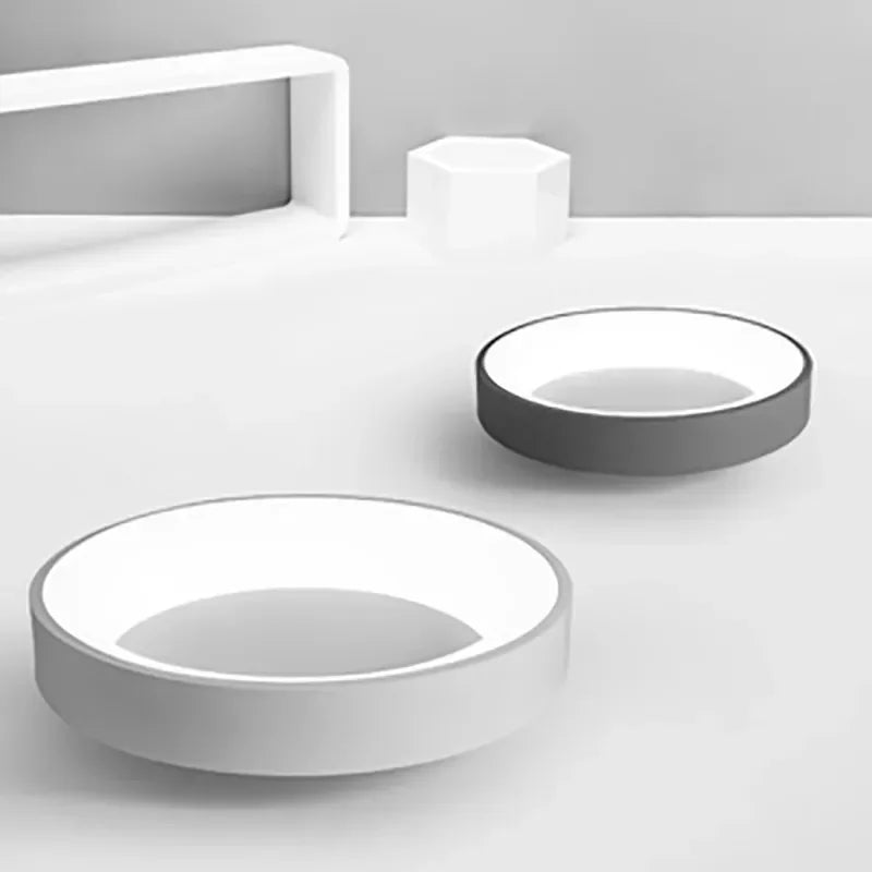 Contemporary round LED ceiling light, sleek Nordic design for modern interior decor, energy efficient.