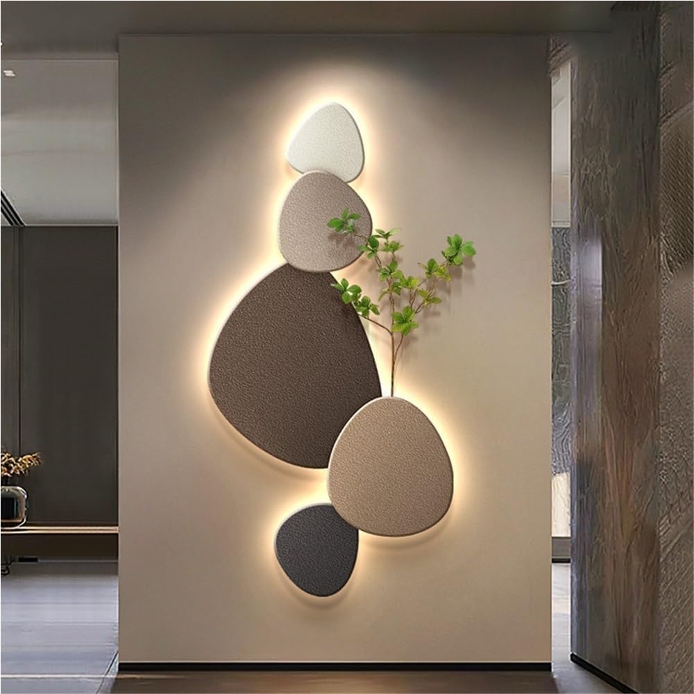 Decorative modern wall lamp with organic design. LED lighting provides soft ambient glow for stylish home decor.