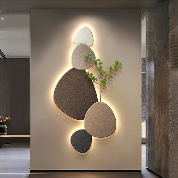 Decorative modern wall lamp with organic design. LED lighting provides soft ambient glow for stylish home decor.