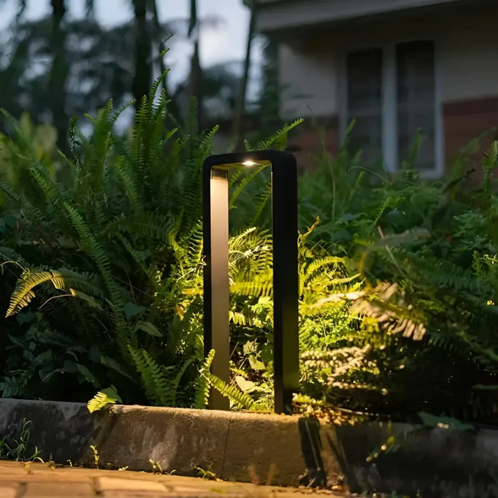 Contemporary LED garden lamp for modern outdoor lighting. Ideal patio or pathway light, weather resistant exterior.