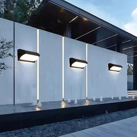 Sleek, energy-efficient outdoor LED wall light. Modern weather-resistant design for porch & exterior home decor.