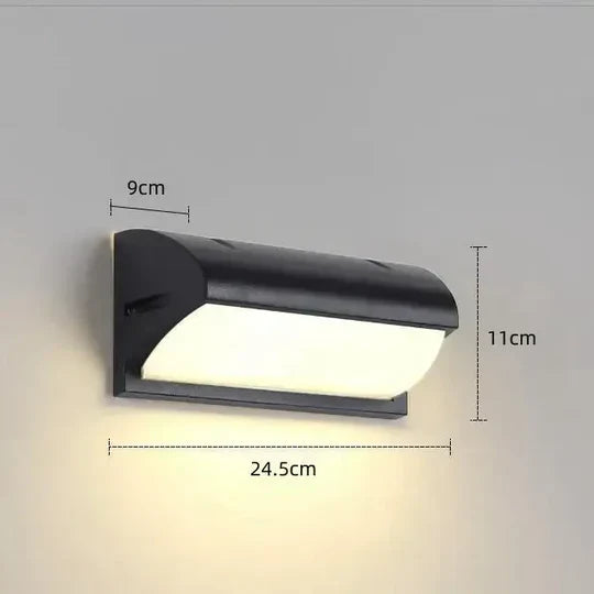 Contemporary outdoor LED wall light, ideal for modern home security & stylish exterior illumination. Motion activated.