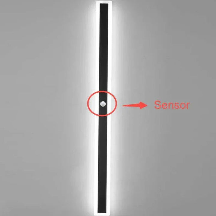 Energy-efficient modern LED wall light, provides bright, decorative illumination for any patio or garden.