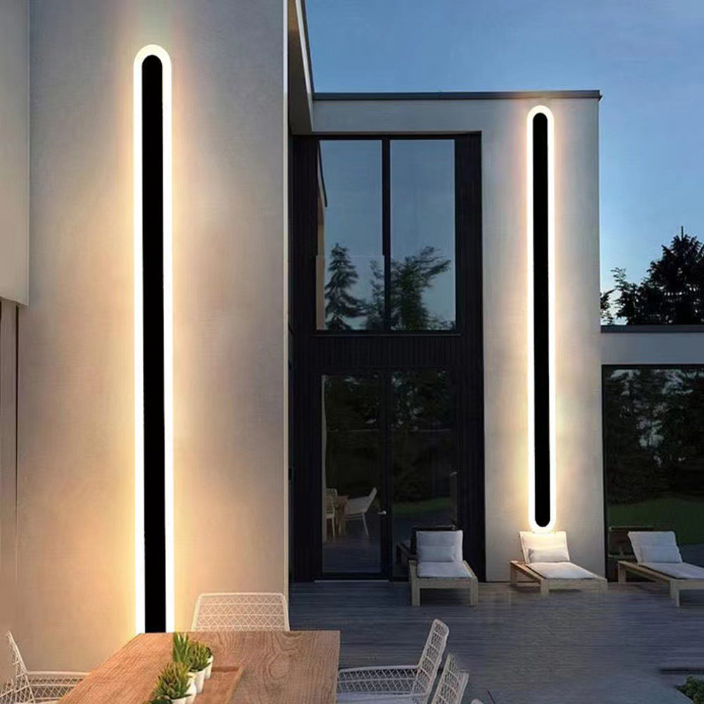 Sleek minimalist LED exterior wall light, dimmable, perfect for modern outdoor decor and garden lighting.
