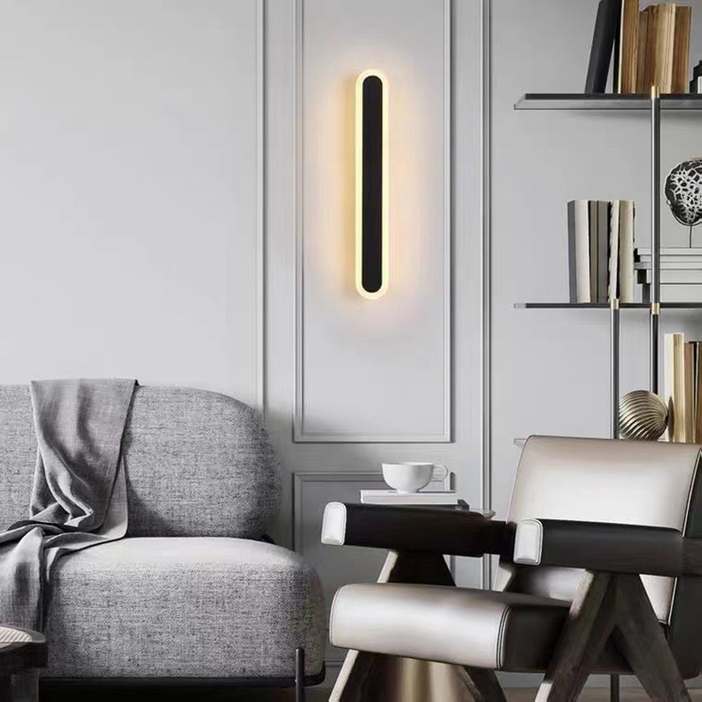 Contemporary black LED exterior wall light, dimmable, enhancing modern outdoor living spaces.