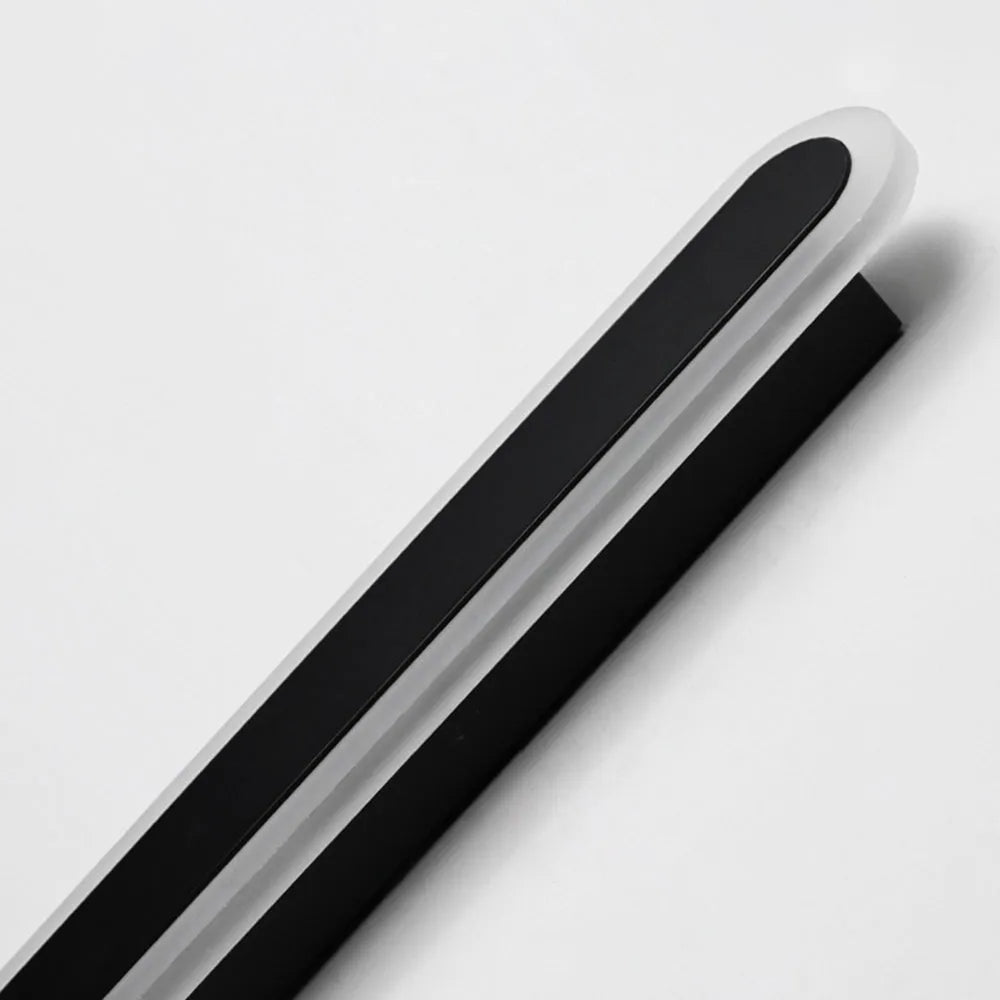 Slim profile modern outdoor LED wall lamp, weather-resistant, casting linear light for elegant pathways.
