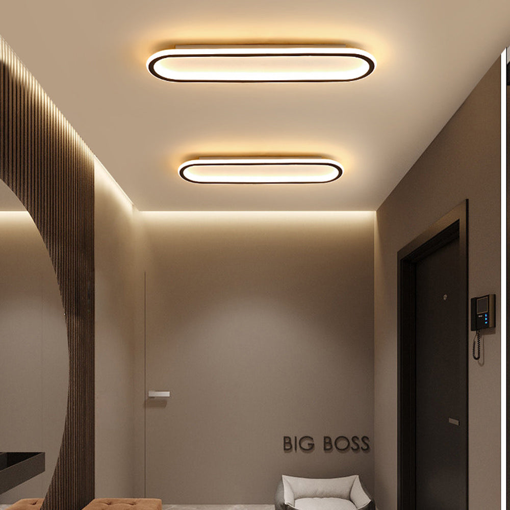 Cool White Oval LED Flush Mount Ceiling Light, bright modern light for spaces.