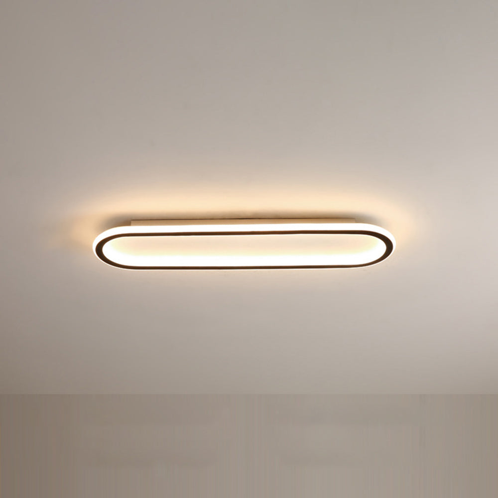 Gold Oval LED Flush Mount Ceiling Light, statement piece for modern living.