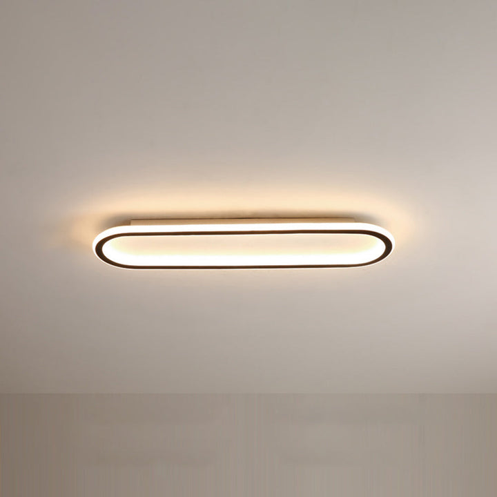 Gold Oval LED Flush Mount Ceiling Light, statement piece for modern living.