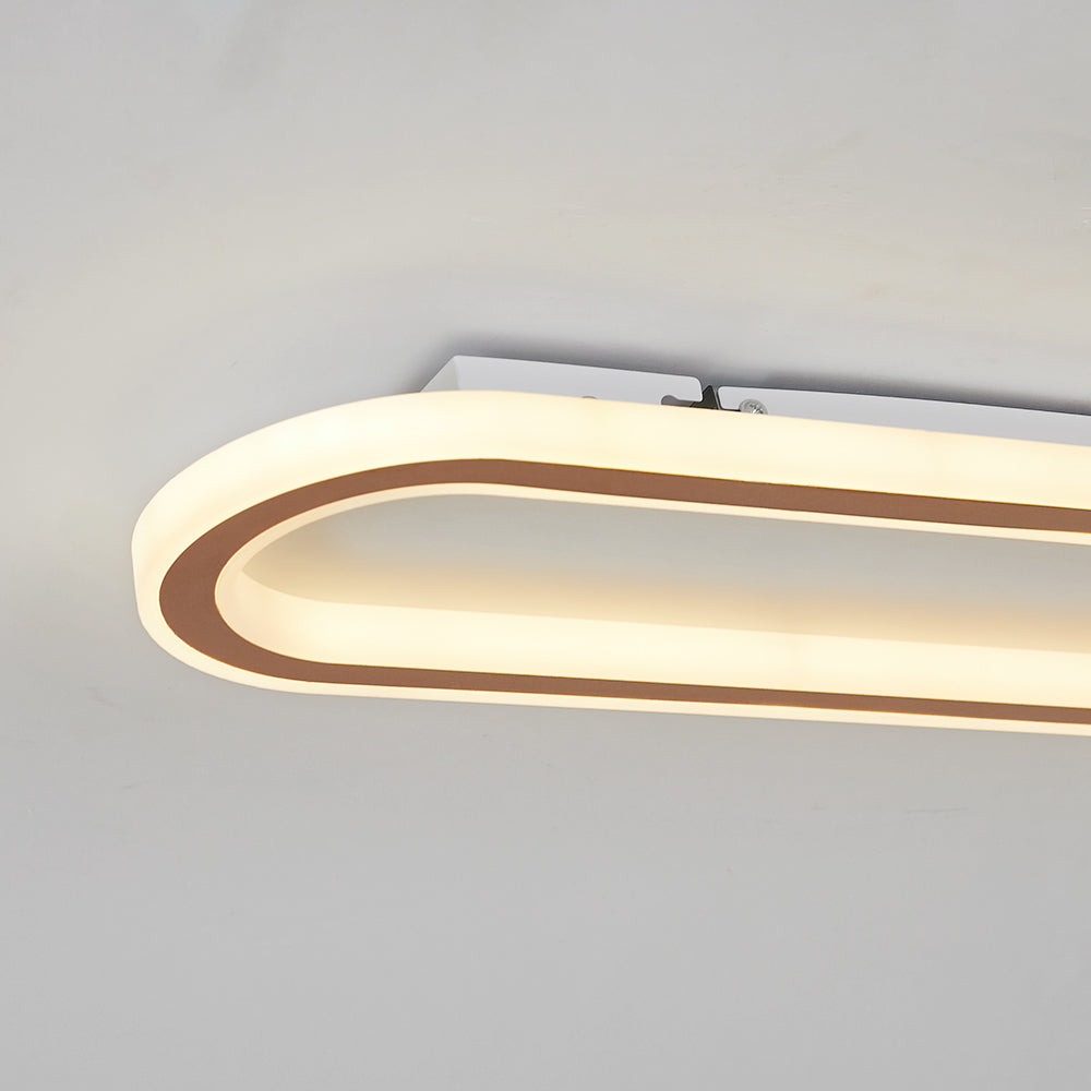 Modern Oval LED Flush Mount Ceiling Light with luxurious gold finish.