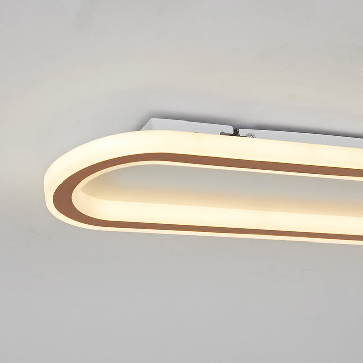 Modern Oval LED Flush Mount Ceiling Light with luxurious gold finish.