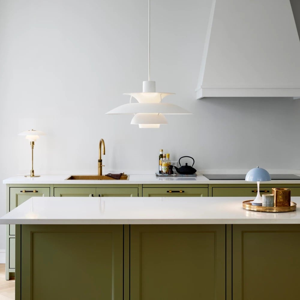 White light Paxano pendant, ideal for task lighting in modern kitchens. Adjustable ceiling fixture.