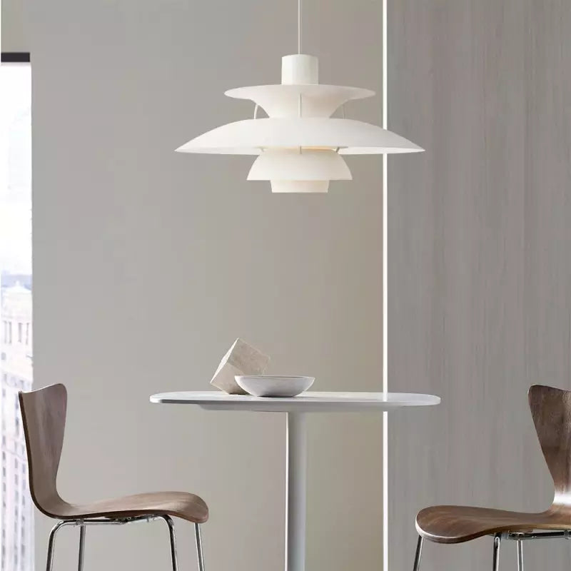 Sleek Paxano modern pendant light, bright white for contemporary kitchens. Stylish ceiling fixture.