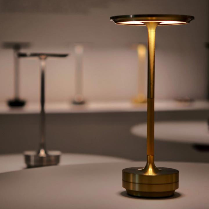 Sleek rechargeable cordless lamp, perfect portable lighting solution for any modern indoor or outdoor space.