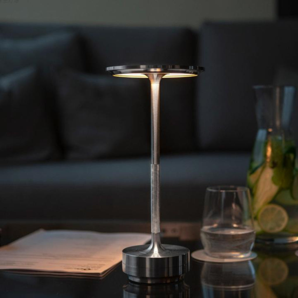 Contemporary accent light, a portable cordless table lamp with modern design, ideal for dining & patios.