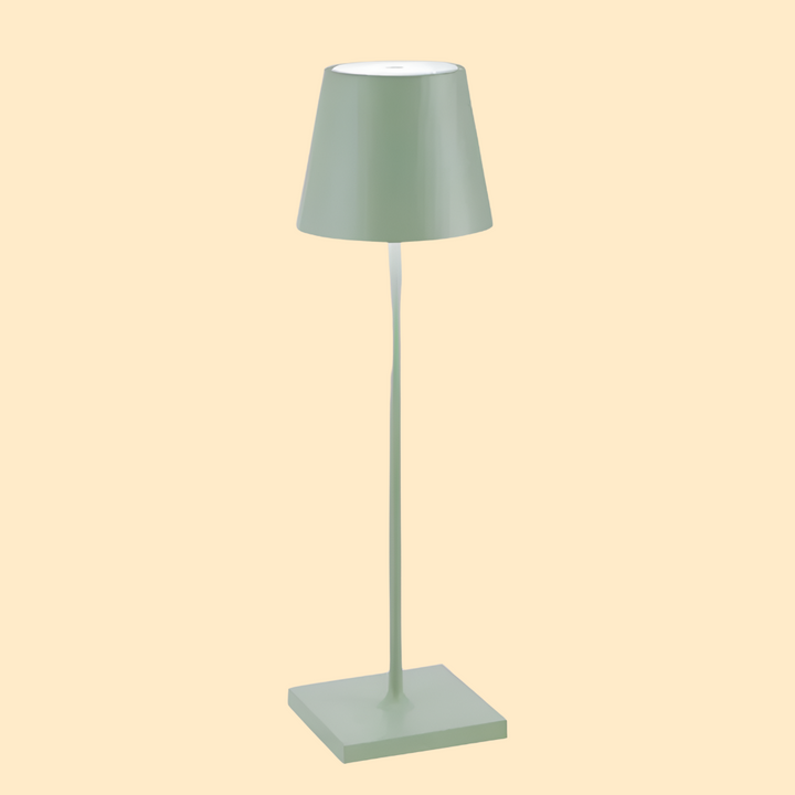 Cordless modern LED table lamp. Rechargeable battery offers flexible, stylish lighting for any space.