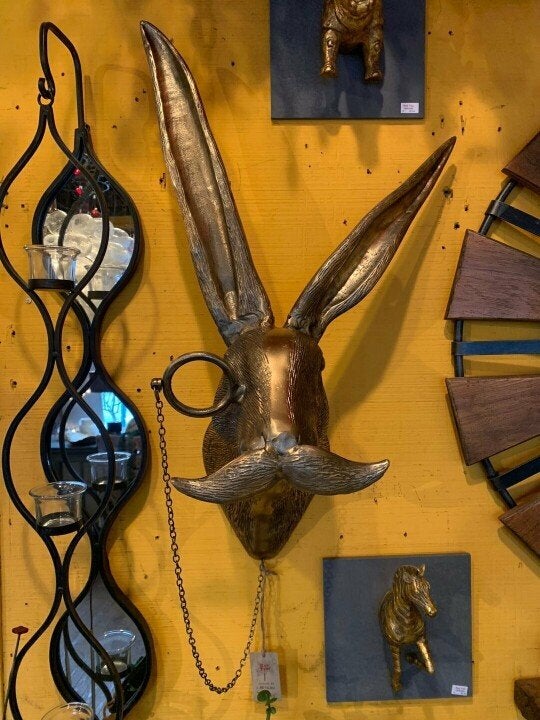 Modern resin animal wall decor, hand-painted for stylish home decoration.
