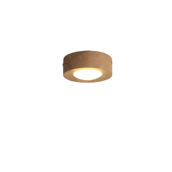 Minimalist walnut wood LED ceiling light. Round design enhances modern home interior lighting.