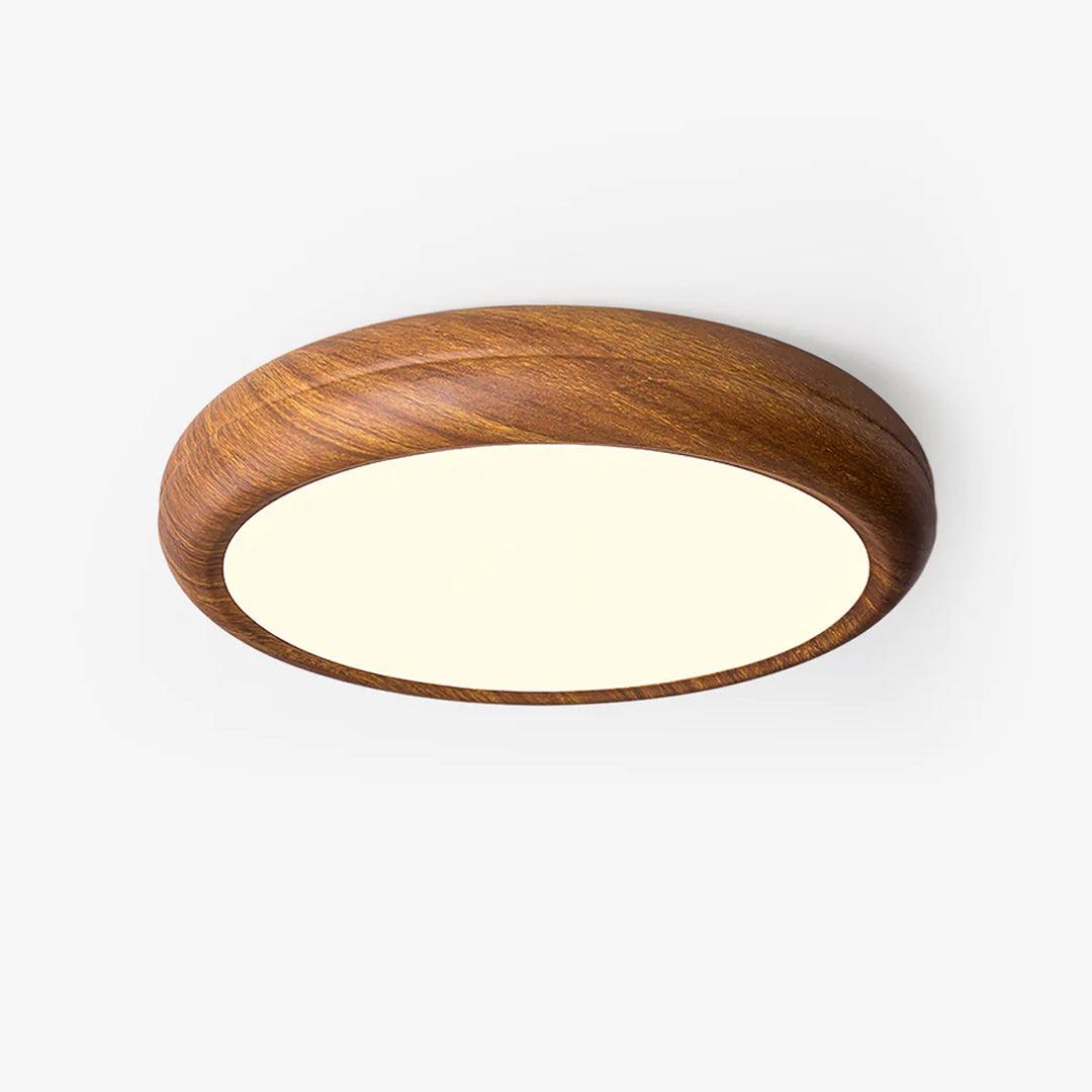 Modern round LED flush mount ceiling light, sleek design for stylish home decor.