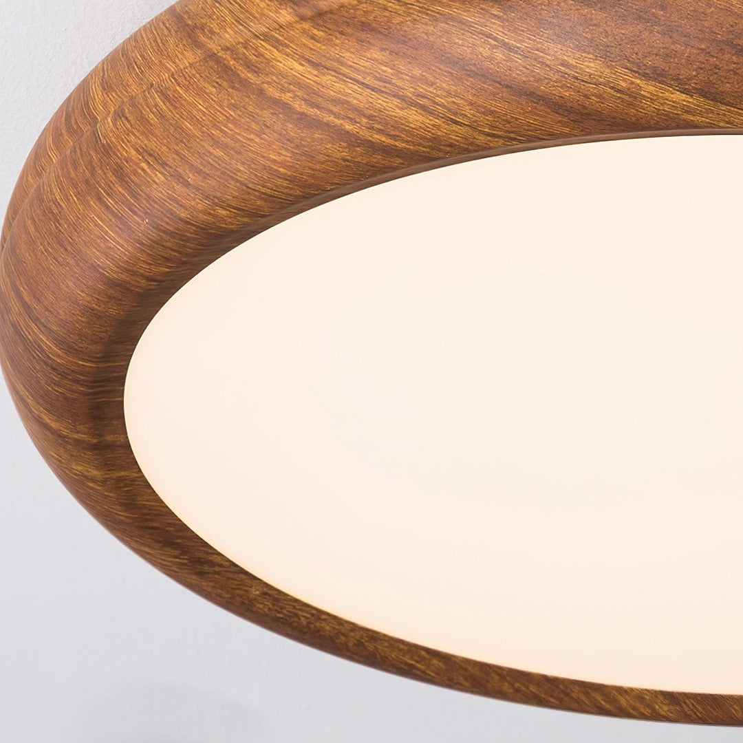 Round LED flush mount ceiling light, modern and dimmable, for comfortable lighting.