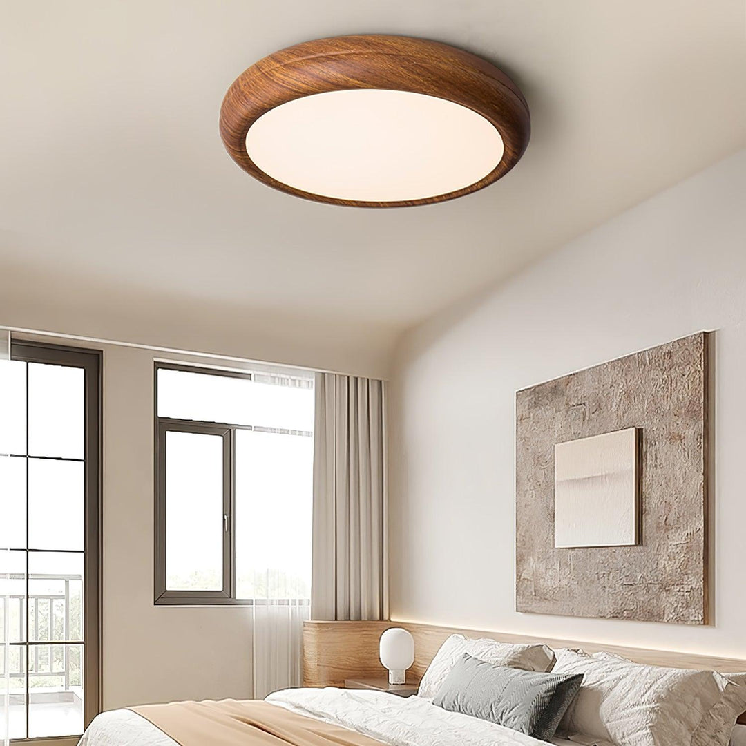 Wood grain modern round LED flush mount, elegant ceiling light for living areas.