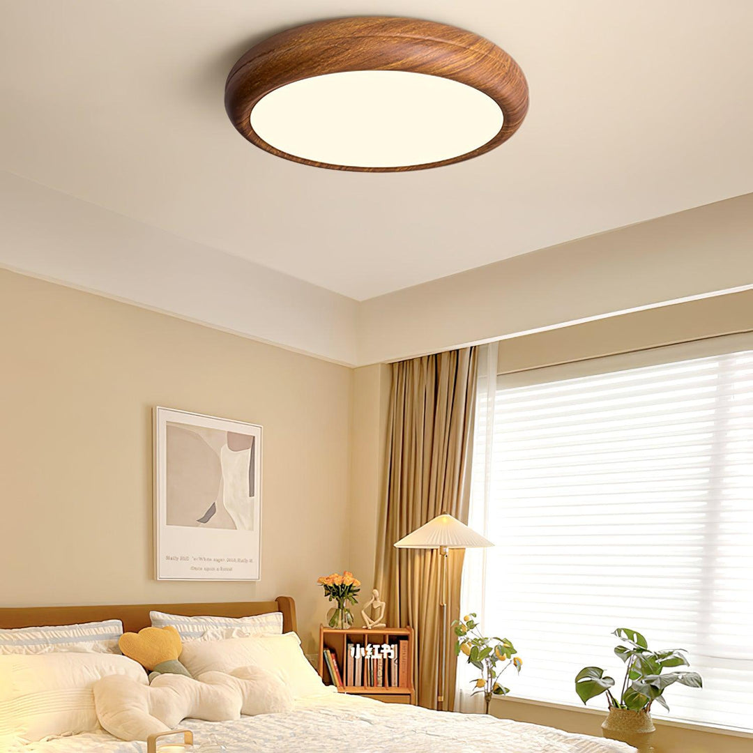 Energy-efficient round LED flush mount ceiling light, modern and stylish.