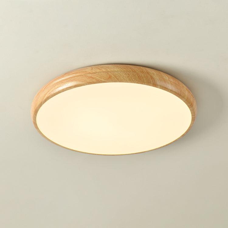 Wood grain round LED flush mount, modern ceiling light, aesthetic appeal.